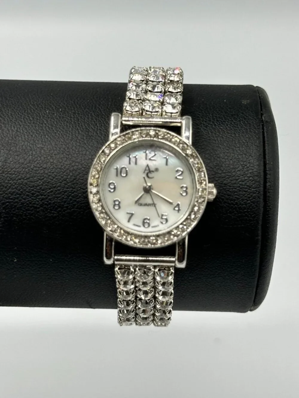 Rhinestone Watch Women Silver Tone Mother of Pearl Dial Stretch New Battery 6.5